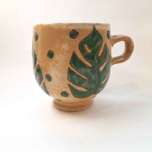 Artistic Pottery Cup – Handcrafted with Leaf Pattern