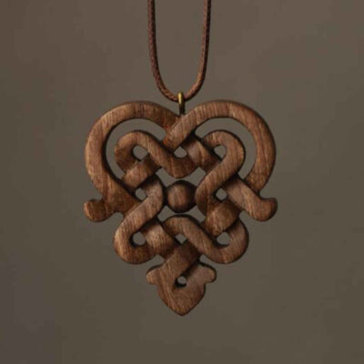 Carved Wood Pendant Handcrafted with Artistic Style Bava