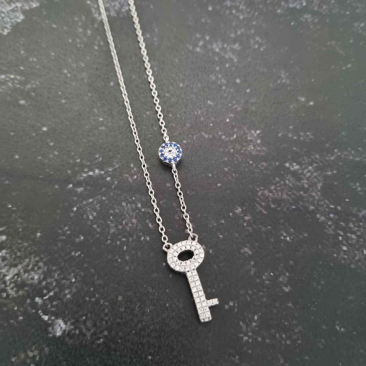 Silver Necklace with Evil Eye Theme Key