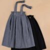Women's Skirt with Suspenders Outfit Featuring Checkered Design