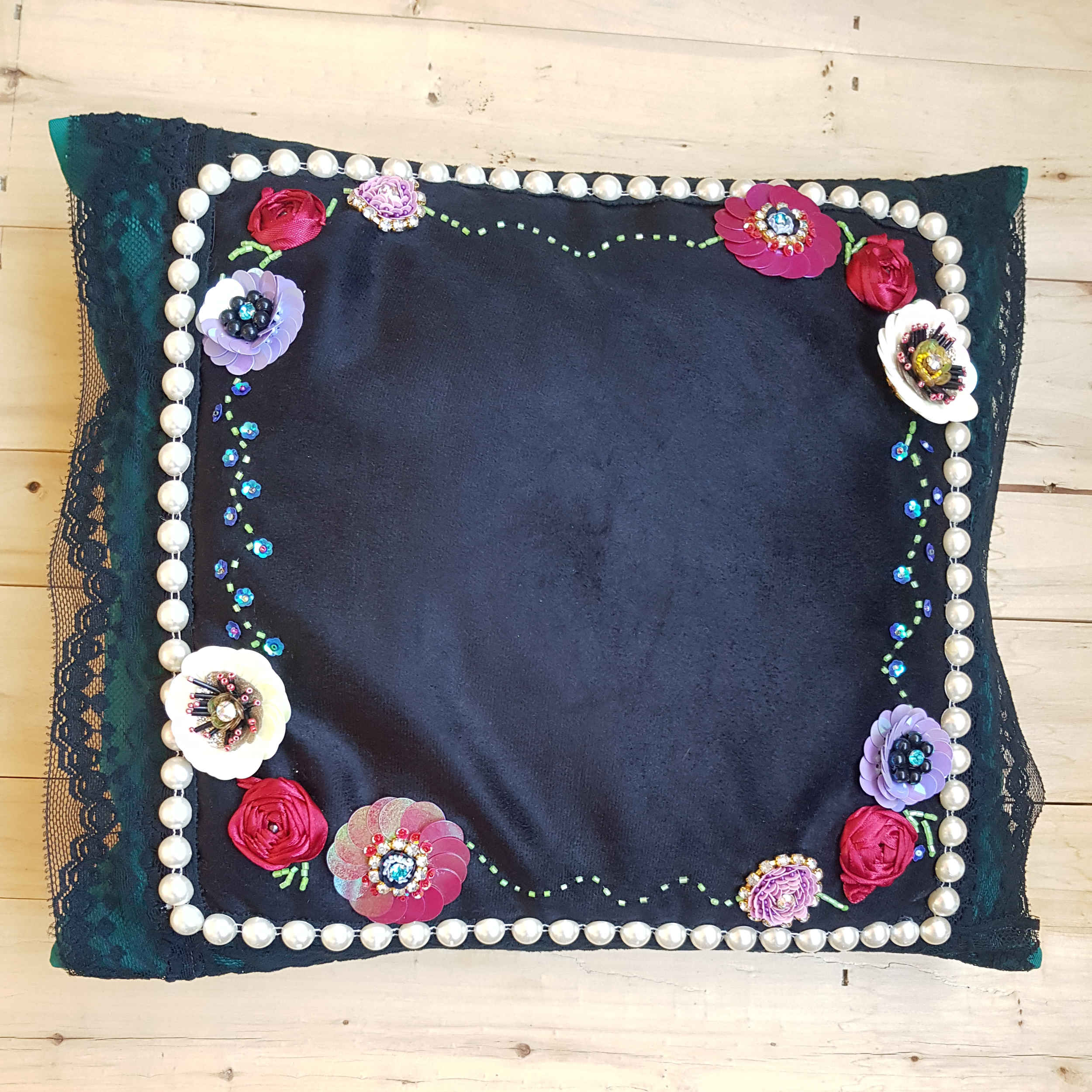 Embroidered Cushion Cover – Handcrafted Crochet Jewelry Design