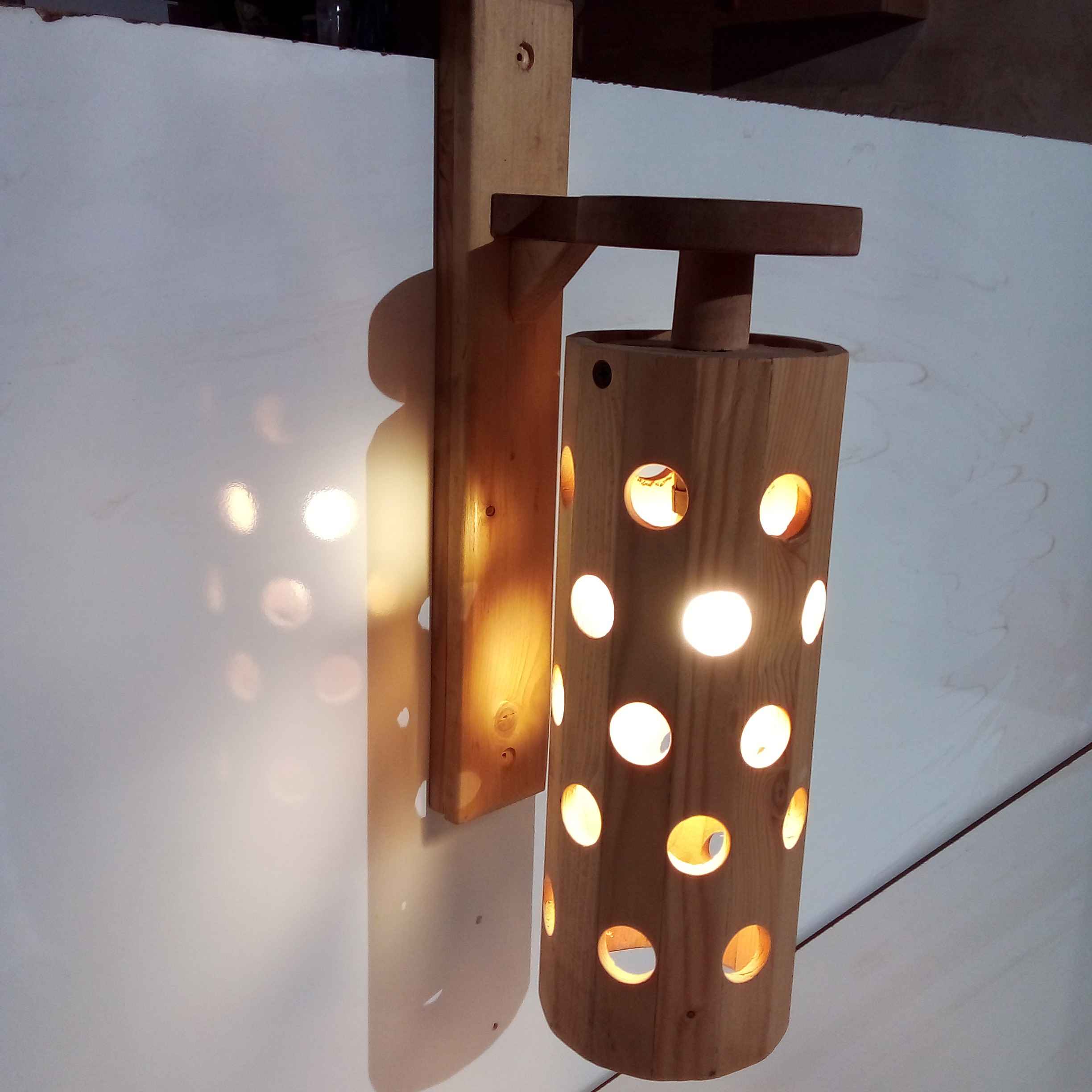 Adjustable Wooden Wall Sconce Light with Hole Design