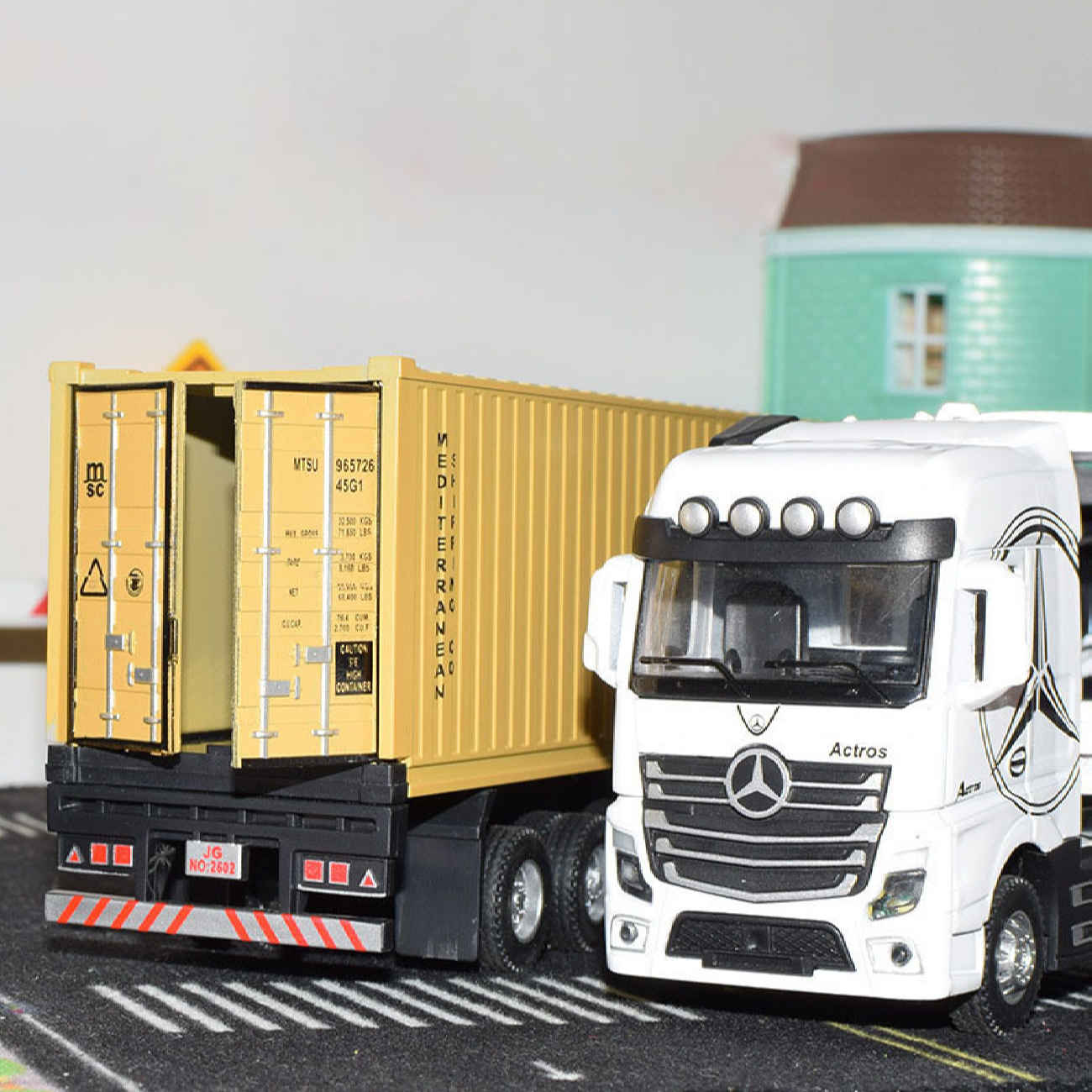 Mercedes-Benz Actros 1996 Toy Truck – with MSC Shipping Container and Intricate Details