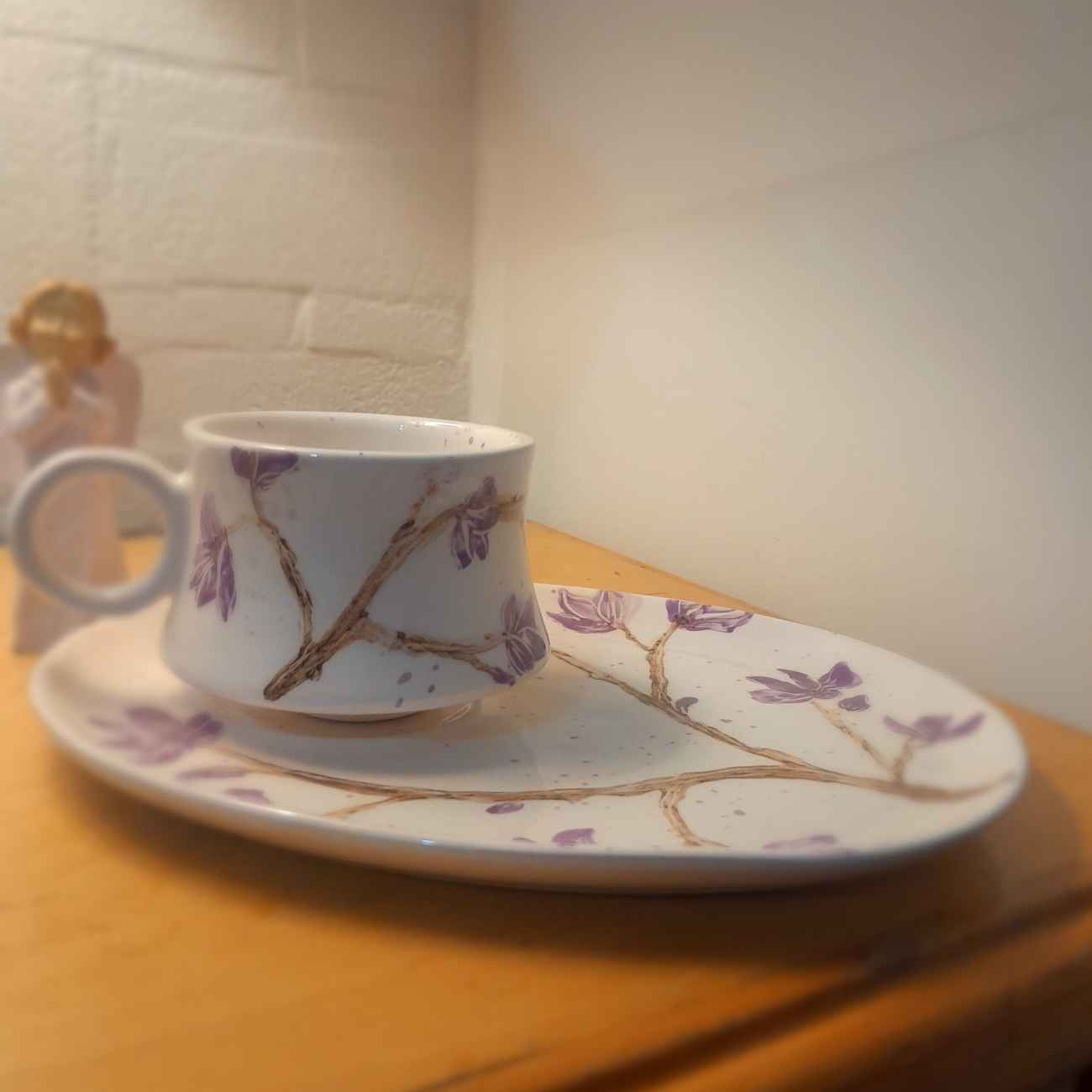 Persian Pottery Teacup and Saucer with Elegant Lavender Design