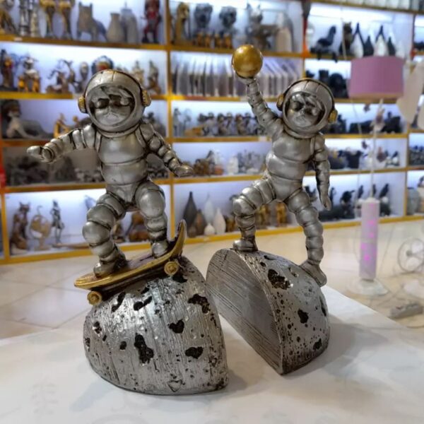 2-Piece Astronaut Figurine Set Book Holder A Unique and Stylish Home Decor Piece