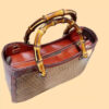 Handmade Genuine Cowhide Leather Bag – Detailed Carving, Stitched with Bamboo Wood Handle