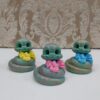 Adorable Snake Figurines with Bows for Nowruz 1404