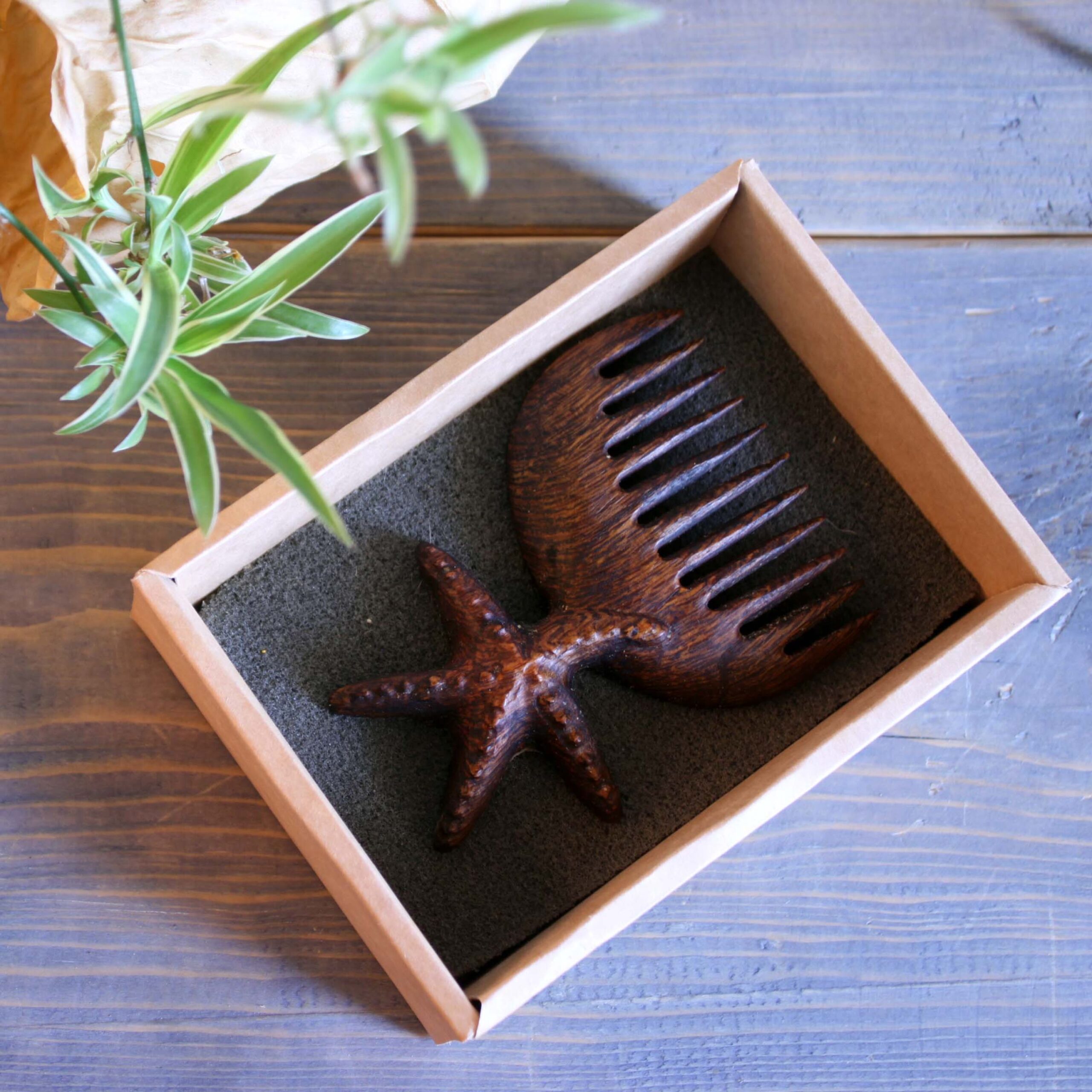 Artisan Hand-Carved Wooden Comb with Delicate Starfish Design