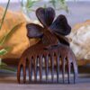 Hand Craved Wooden Clover Comb with Intricate Floral Engraving