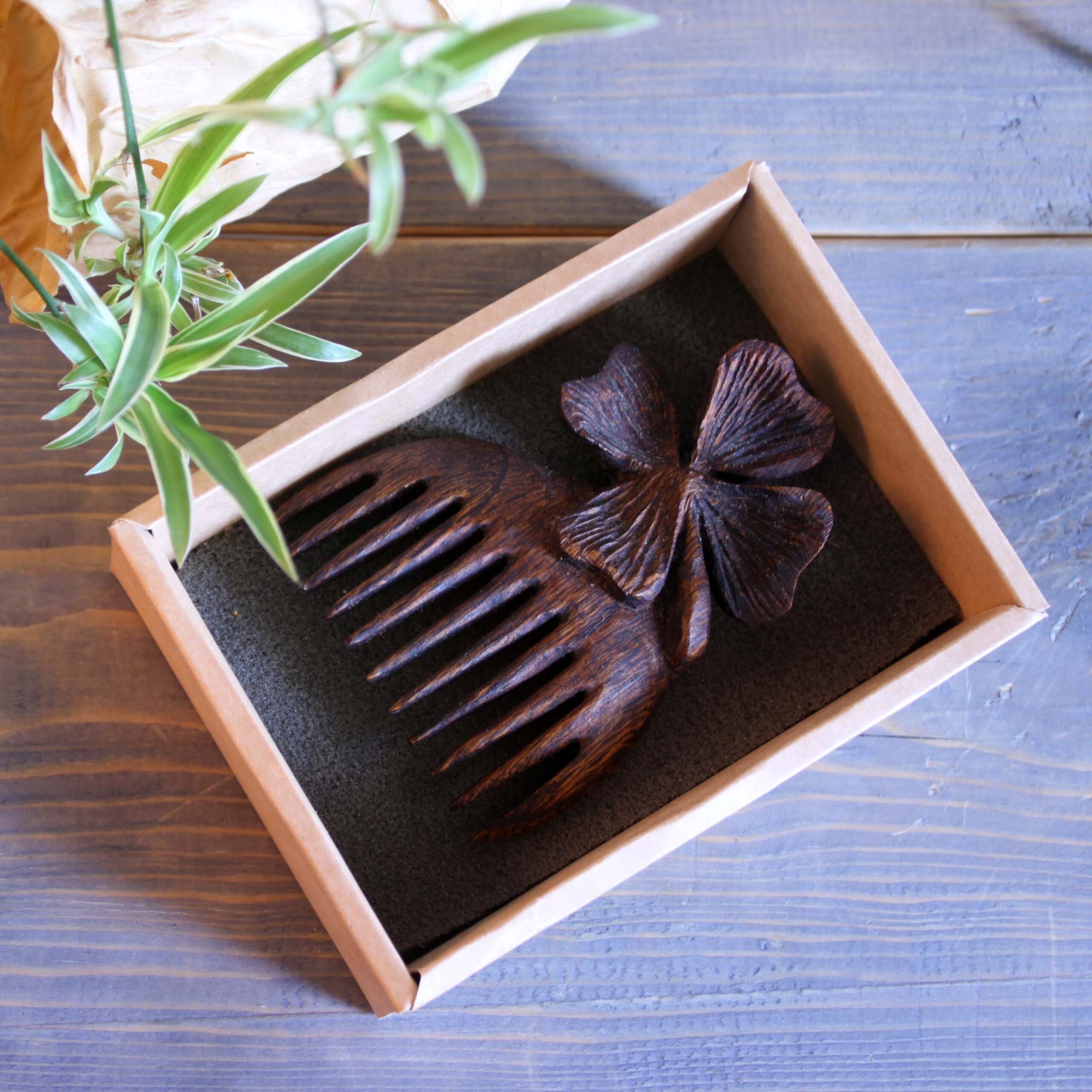 Hand Craved Wooden Clover Comb with Intricate Floral Engraving