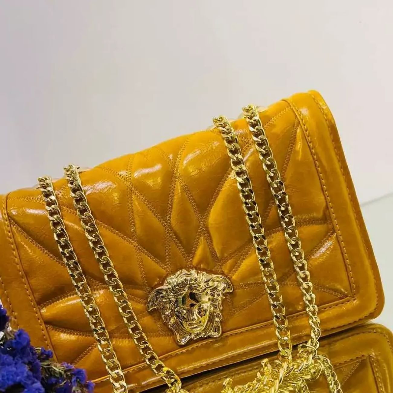 Luxurious Faux Leather Handbag with Statement Chain Strap
