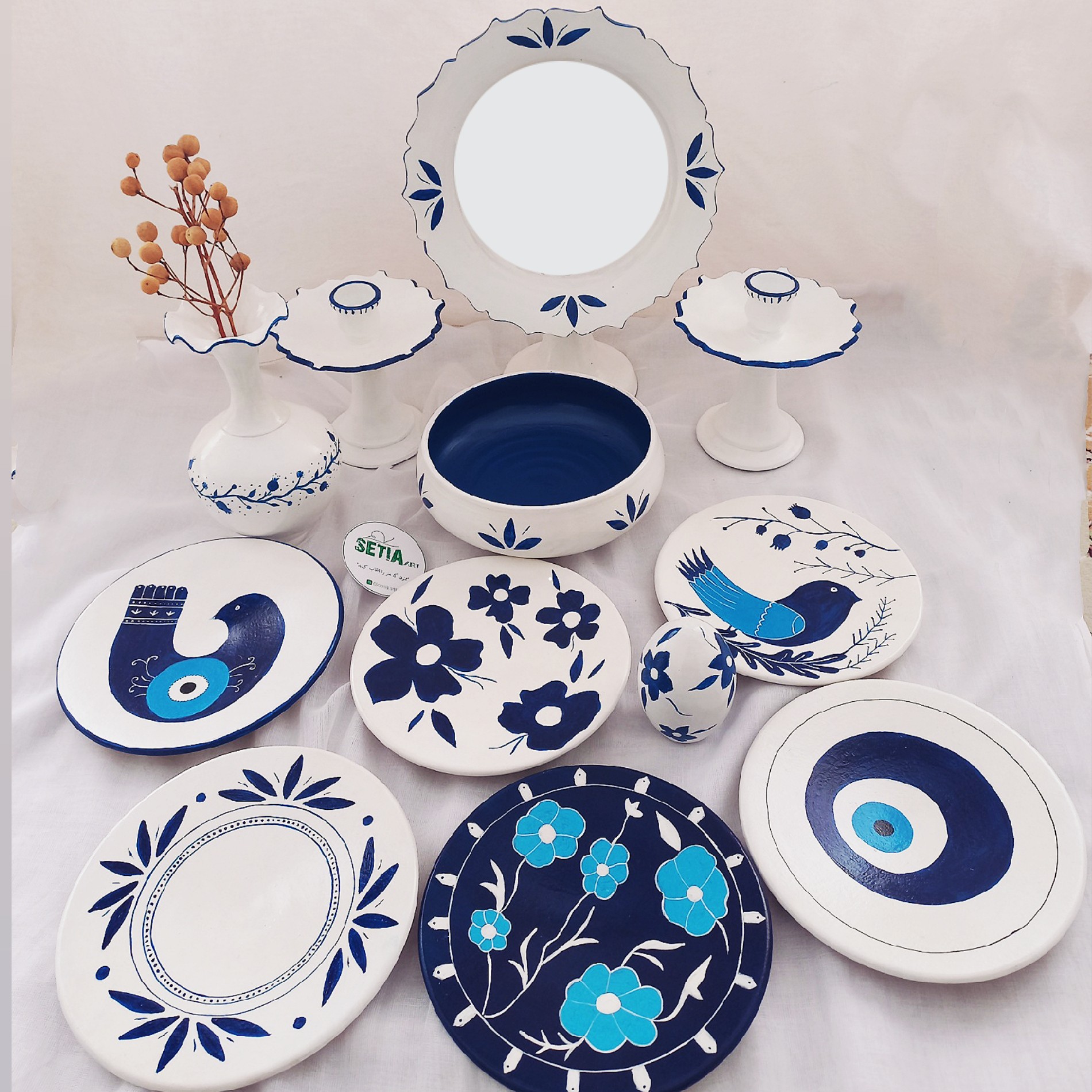 Symbolic Beauty A Hand-Painted Haft Seen Set with Floral, Bird & Evil Eye Motifs Set of 12