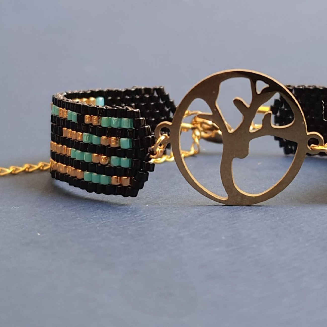 Woven Steel Beaded Bracelet for Women – Deer Pendant Design