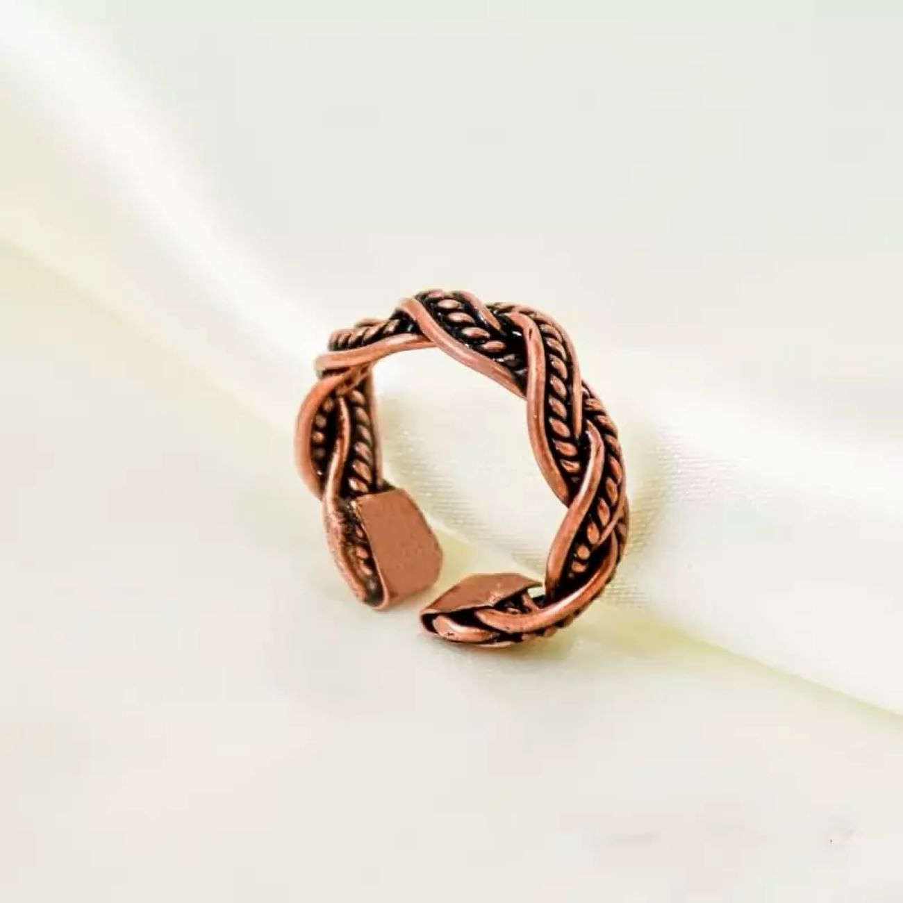 Copper Ring with a Narrow Braided Design