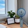 Compact Hand Fan with USB Charging – Lightweight Clip-On Personal Cooling Device