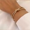 Minimal Knot Cuff Bracelet – Symbol of Strength & Connection for Special Moments