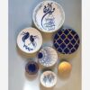 Pottery Wall Plates with Wan Yakad and Bird Design — Set of 7