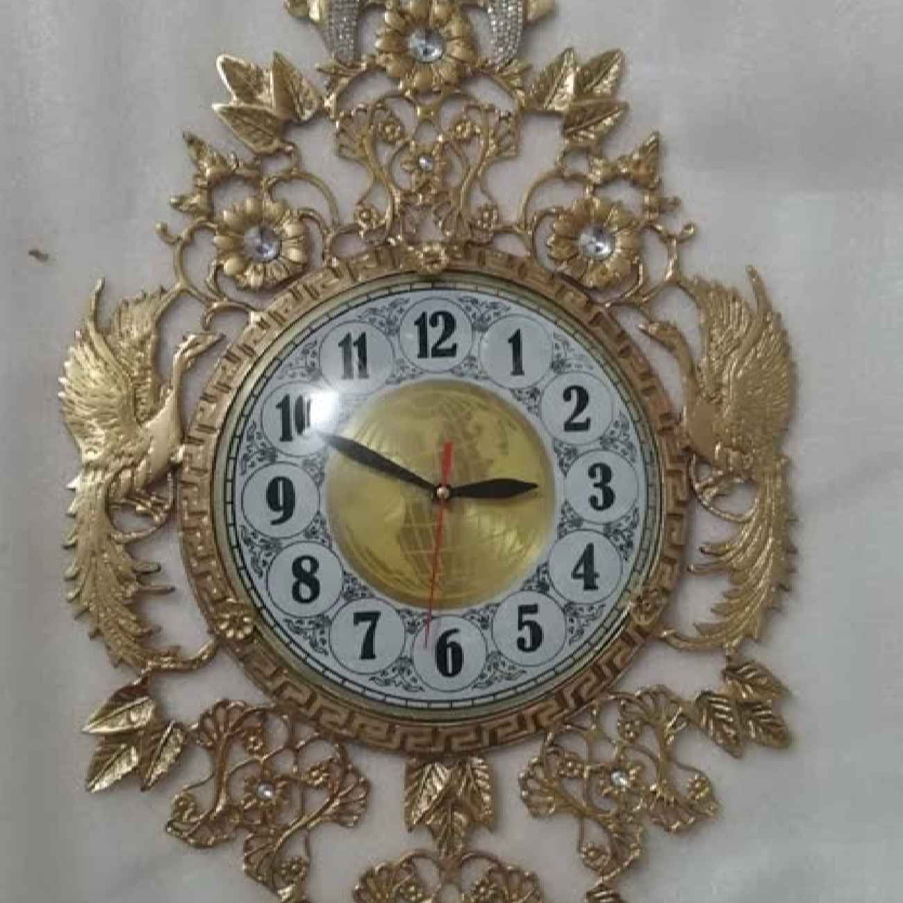 Timeless Brass Wall Clock with Intricate Details to Enhance Your Home