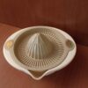 Plastic Hand Juicer in Cream & Brown – Manual Squeezer for Natural Home Aesthetic