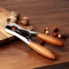 Stylish Wooden-Handled Nutcracker with Durable Metal Body, Combining Strength and Classic Design (4)