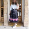 Black-Pleated-Satin-Skirt-with-White-Polka-Dots-and-Bold-Pink-Floral-Hem-2