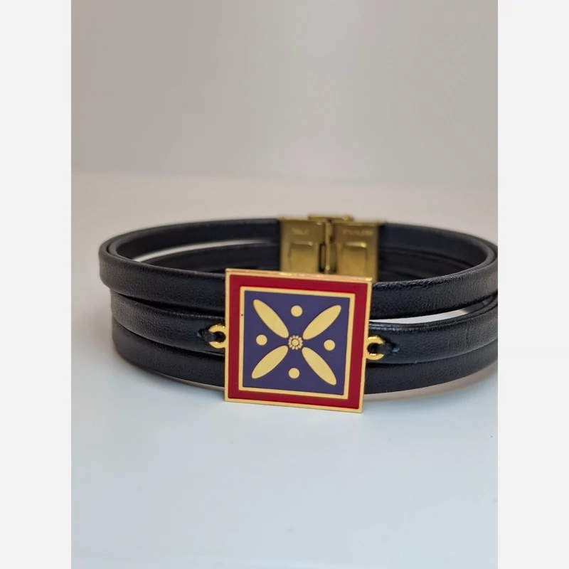 Main image of Drafsh Kaviani Leather Bracelet – Gold-Plated Emblem Charm in Ancient Iranian Design