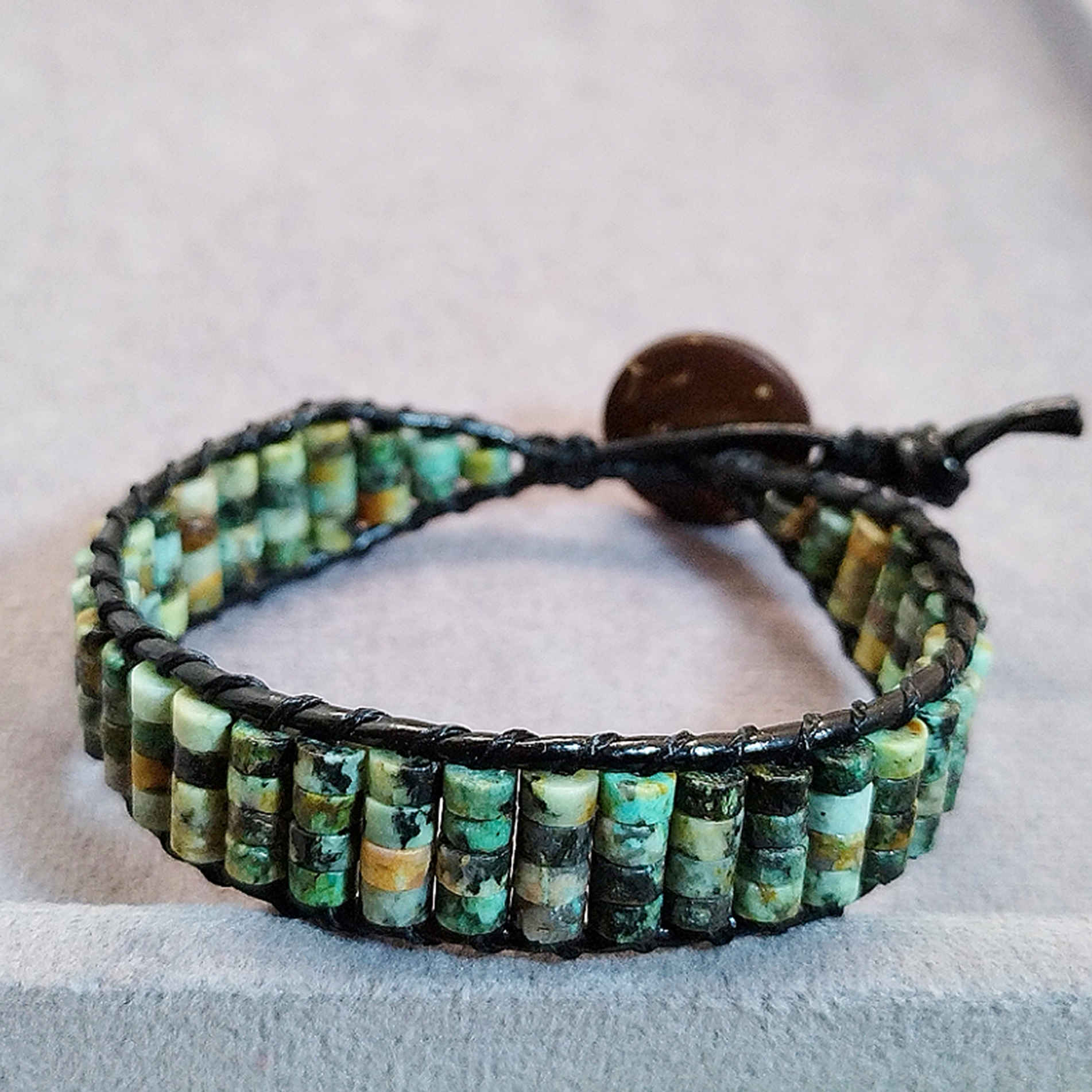 Elegant Bracelet with Turquoise Cylinder Beads & Classic Button Closure