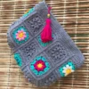Handmade-Crochet-Granny-Square-Handbag-–-Colorful-Floral-Motif-with-Zipper-Closure-ad-Tassel-Detail