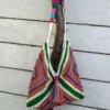 Handmade-Crochet-Shoulder-Bag-–-Colorful-Granny-Square-Design-with-Tassel-and-Button-Closure