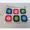 Handmade-Crochet-Tassel-Handbag-with-Vibrant-Flower-Design-–-Featuring-Zipper-Closure-and-Lined-Inside