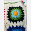 Handmade-Crochet-Tassel-Handbag-with-Vibrant-Flower-Design-–-Featuring-Zipper-Closure-and-Lined-Inside3