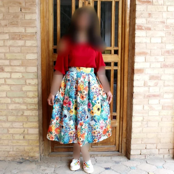 Pleated-Satin-Skirt-with-Bold-Paper-Style-Floral-Motifs-and-Tiered-Colorblock-Design-1