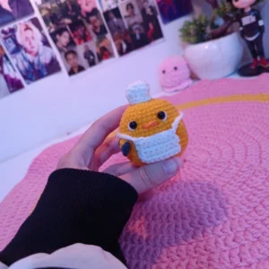 Handmade Crochet Orange Keychain – Soft Yarn Bag Charm with Green Leaf and White Blossom